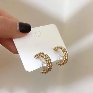 Twisted Gold Hidden Pearl Hoop Earrings